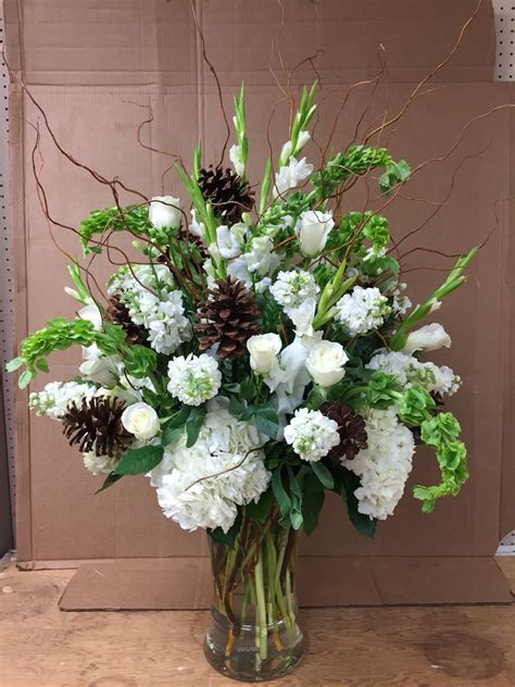 Wedding centerpiece, alter flowers, ceremony, winter, white hydrangea, roses, gladiola, stock ...