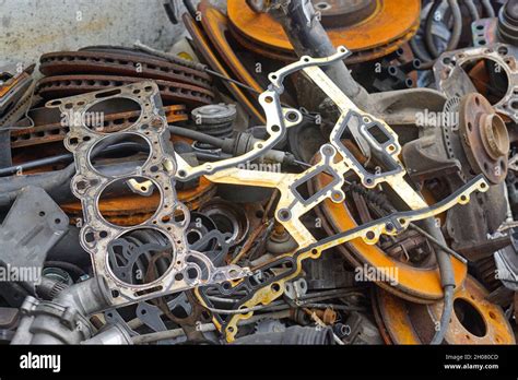 Old car parts scrap metal for recycling Stock Photo - Alamy