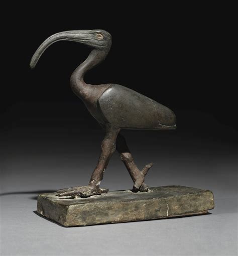 An Egyptian Bronze Figure of an Ibis, Late Period, 716-30 B.C. sacred to the god Thoth, strid ...