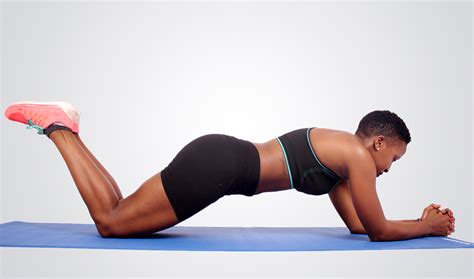 Fitness Woman Doing Knee Plank Variation
