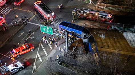 NY passenger bus hangs off overpass in the Bronx after crash, at least 8 left injured - ABC News