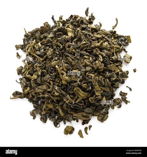 Dry oolong tea leaves isolated on white background. Fermented Chinese green tea. Top view Stock ...