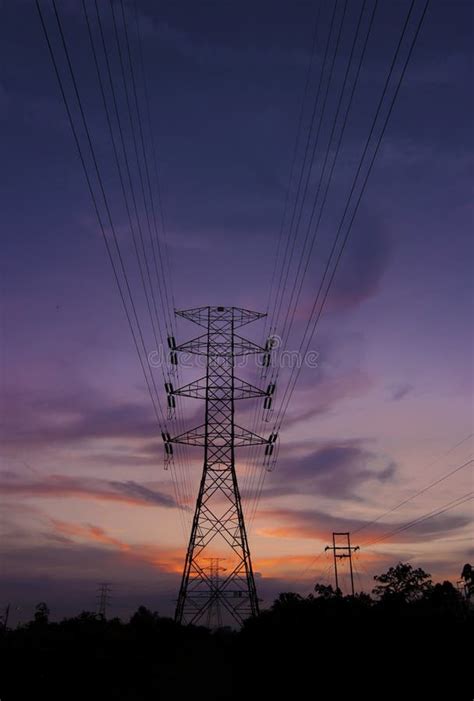 A Silhouette of Electricity Pylons Stock Image - Image of pole ...