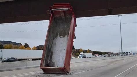 Video emerges of dump truck hitting major Toronto highway bridge | CBC News