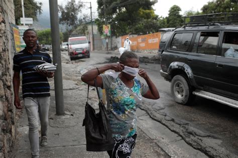 Haitian neighborhood exacts fiery revenge on gang members