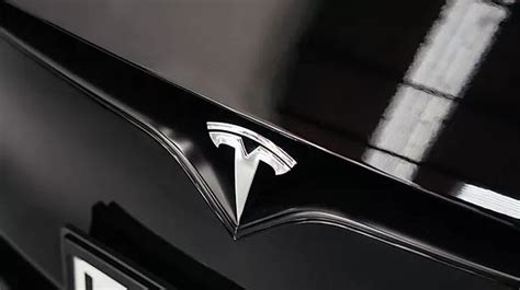 Tesla Logo Meaning: Cat Nose or Motor Cross Section? – LogoCentral