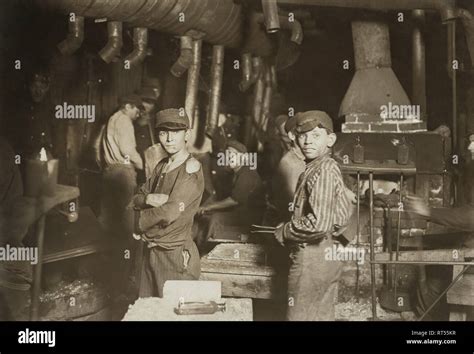 Young child labor workers in a glass factory in Indiana at midnight, 1908 Stock Photo - Alamy