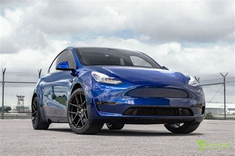 Deep Blue Metallic Tesla Model Y Performance with 20" Falcon Y Wheels | Tesla model, Tesla ...