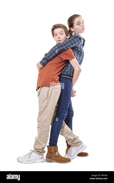 teenager siblings hugging back on back, isolated on white Stock Photo - Alamy