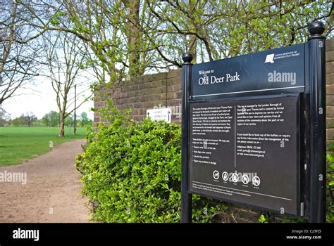 information board by an entrance to old deer park, richmond upon thames ...