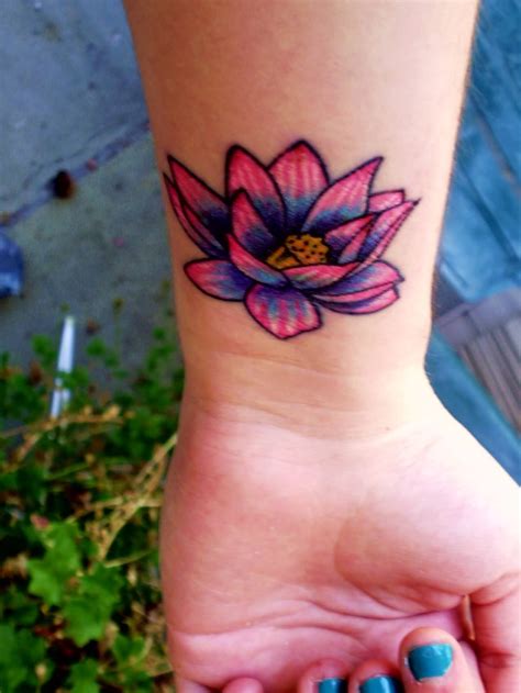 Lotus Flower Wrist Tattoo Idea For Girls