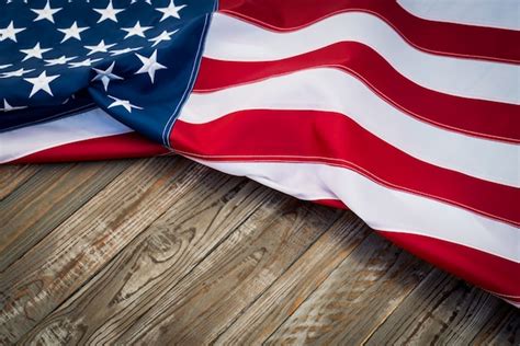 Free Photo | American flag on a dark wooden table