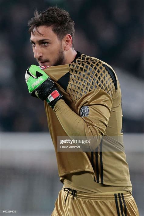 Gianluigi Donnarumma of AC Milan kisses his shirt during the Serie A ...