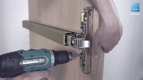 Three locking point TOP panic exit device installation – TESA ASSA ABLOY - YouTube