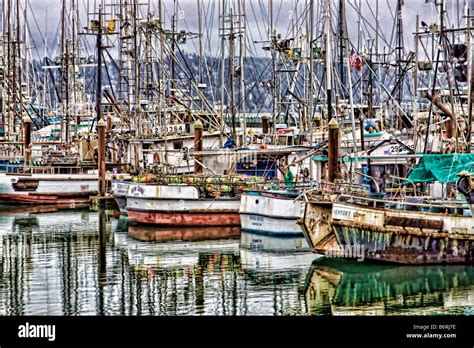 Photo illustration painterly effect of fishing boats on the Oregon coast Stock Photo - Alamy