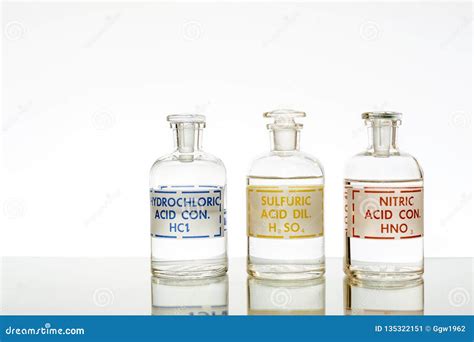 Three common mineral acids stock image. Image of glassware - 135322151