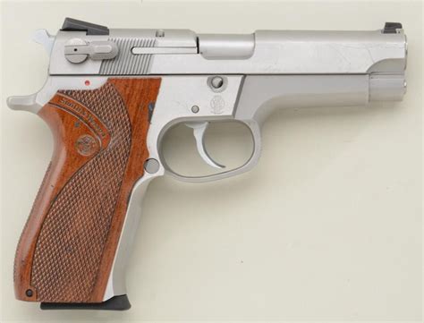 Smith & Wesson Model 5906 DA semi-auto pistol, 9mm cal., 4” barrel ...