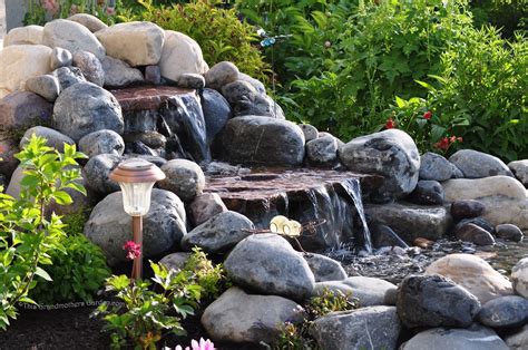 Landscaping, Beautiful Garden Waterfalls With Natural Rock Surround By Plant Ideas: Beautiful ...