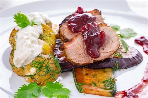 Roasted duck breast with cranberry sauce Stock Photo by ©Patryk_Kosmider 53523823