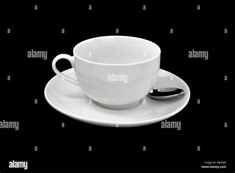 Isolated coffee cup on a black background Stock Photo - Alamy