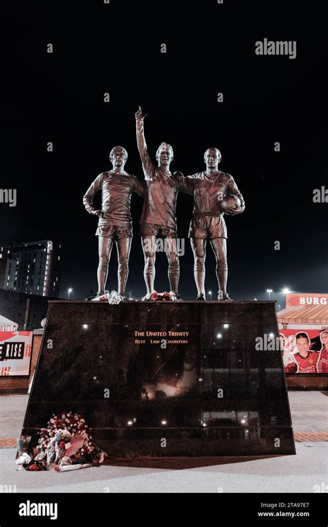 Trinity Statue of George Best, Bobby Charlton, and Denis Law outside of Manchester United FC at ...