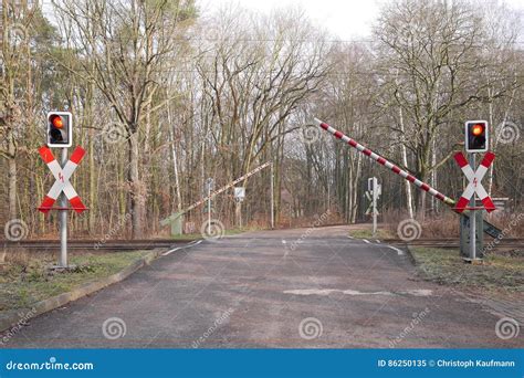 Barriers Coming Down on a Level Crossing Stock Image - Image of motorists, arms: 86250135