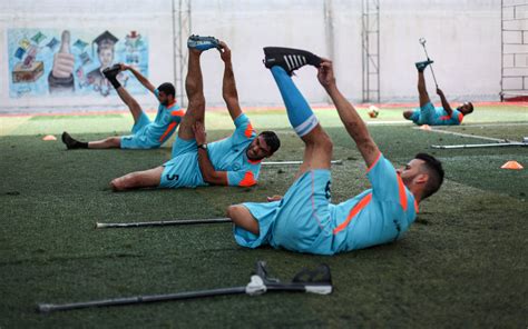 Young Gaza amputees play soccer again after coronavirus curbs eased ...