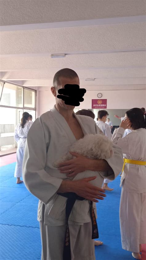 [OC] My Aikido trainer holding his dog in his Kekogi (face blurred for privacy) : r/MadeMeSmile