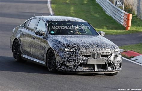 2025 BMW M5 spy shots and video: Hybrid power set for redesigned super ...