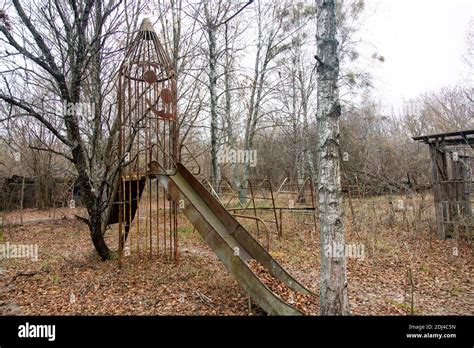 Scary and abandoned playground in a village near Pripyat, a ghost city in the Chernobyl ...