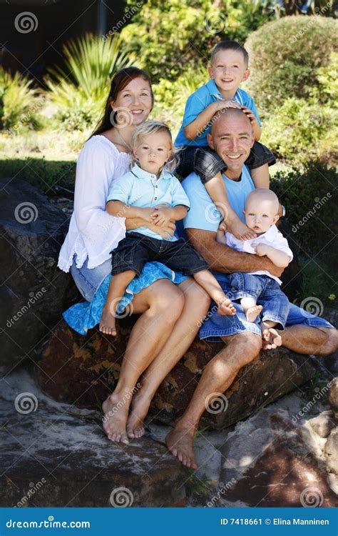 Happy family outdoors stock image. Image of outside, parents - 7418661