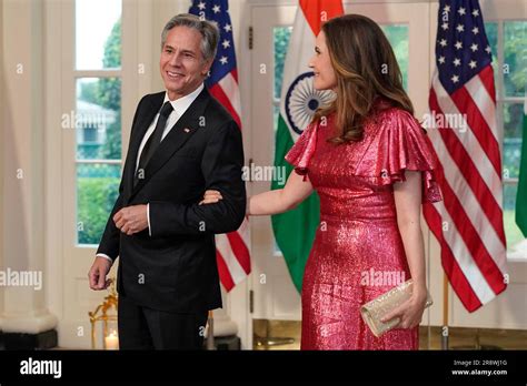 Secretary of State Antony Blinken and his wife Evan Ryan, arrive for the State Dinner with ...