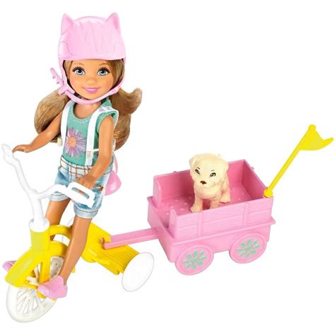 Ride to the carnival in style with this adorable Chelsea doll that comes with a tricycle, wagon ...