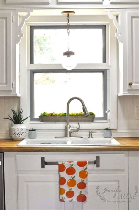 Sink area mini-makeover with brass towel bar under the sink - Jennifer ...