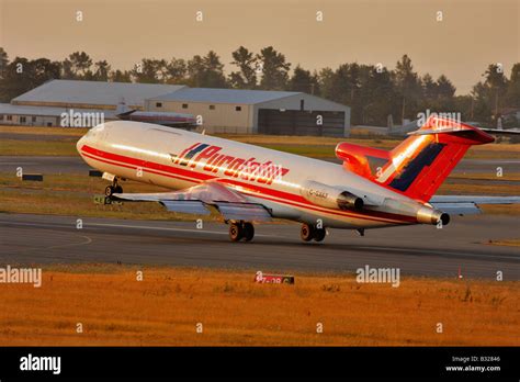 Boeing 727 courier jet landing at Victoria airport in early morning Victoria British Columbia ...