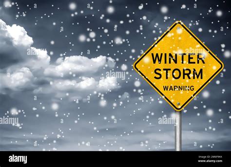 Winter Storm warning - road sign information Stock Photo - Alamy