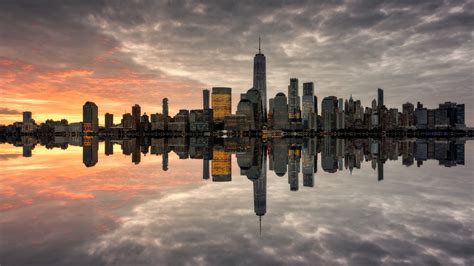 Manhattan Skyline The Most Populated New York City Sunnset Reflection ...