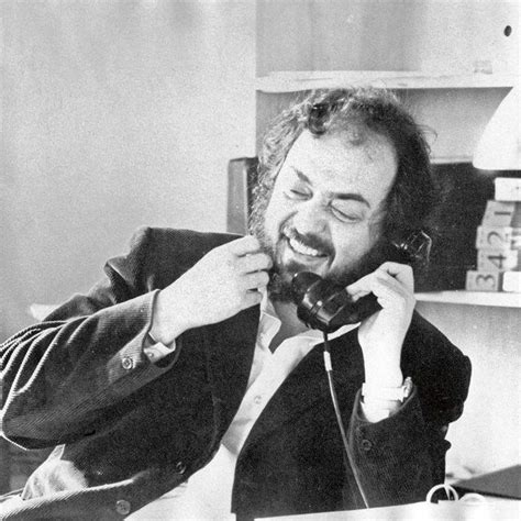 black and white photograph of a man talking on the phone