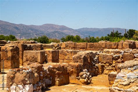 Ancient archaeological site in Crete with stone ruins Stock Photo ...