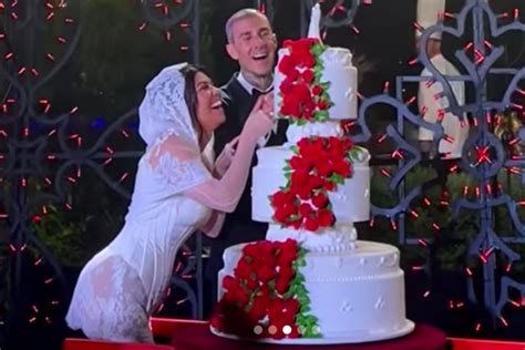 Watch Kourtney Kardashian and Travis Barker Cut Their Wedding Cake