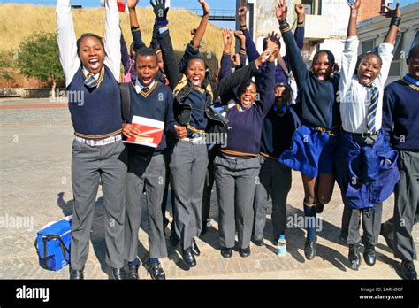 Primary school students cheering, Braamfontein, Johannesburg, Gauteng ...