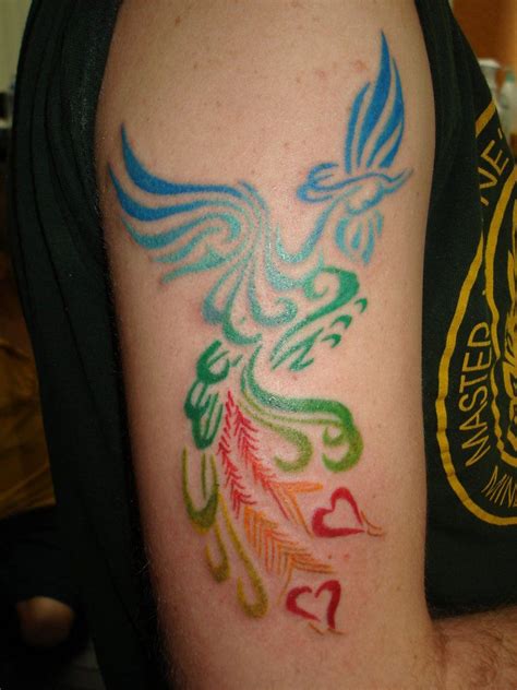 Tribal rainbow phoenix! | Tattoo dragon and phoenix, Phoenix tattoo design, Small wrist tattoos