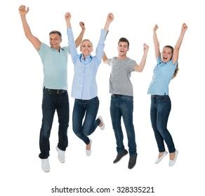 Group Excited People Jumping Over White Stock Photo 328335221 ...