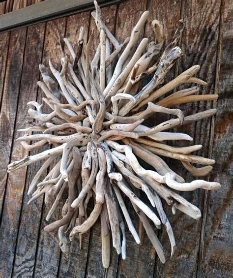Visit https://diydriftwood.com/make-a-driftwood-wall-sculpture/ to make your own sculpture ...