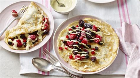 Pancakes with berries and white chocolate recipe - BBC Food