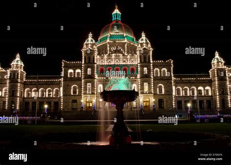 Victoria, BC, Canada provincial Parliament buildings with Christmas lights at night. Provincial ...