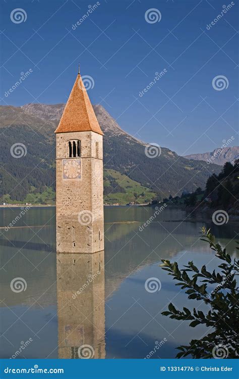 Church Tower At Lake Reschen Stock Photo - Image: 13314776