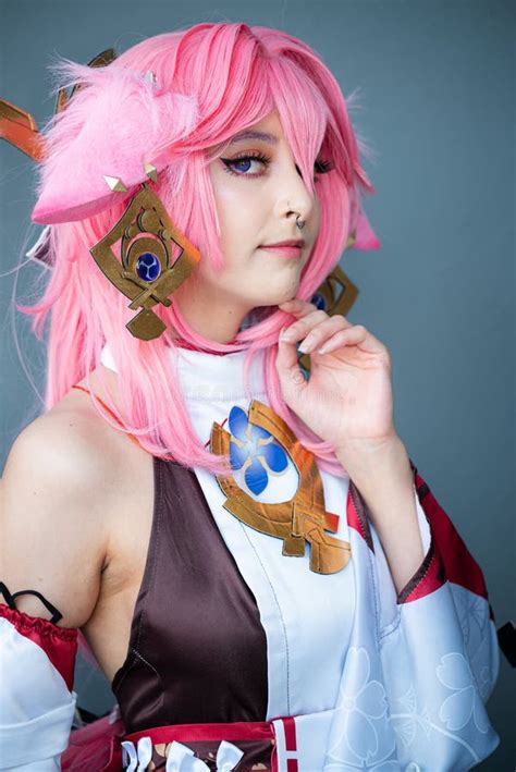 Female Cosplayer in a Pink Anime Costume Wearing Pink Hair Stock Image - Image of exuberant ...