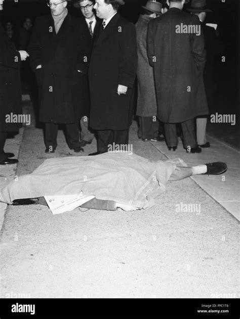 CRIME SCENE, 1952. /nThe body of Arnold Schuster (1928-1952), who was ...