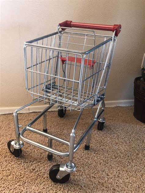 This Little Metal Grocery Cart Toy is just like a REAL Shopping Cart.